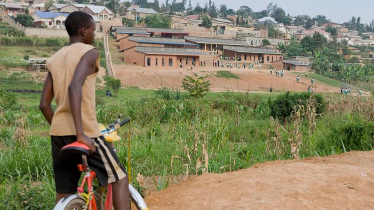 Photo of the Umubano Primary School, Photo by Iwan Baan, Photo of Surrounding Landscape and Boy on his Bike
