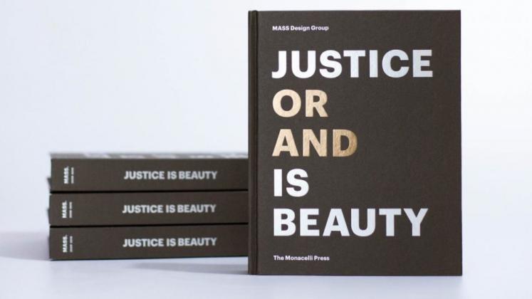 Stacked copies of the MASS Monograph, Justice is Beauty
