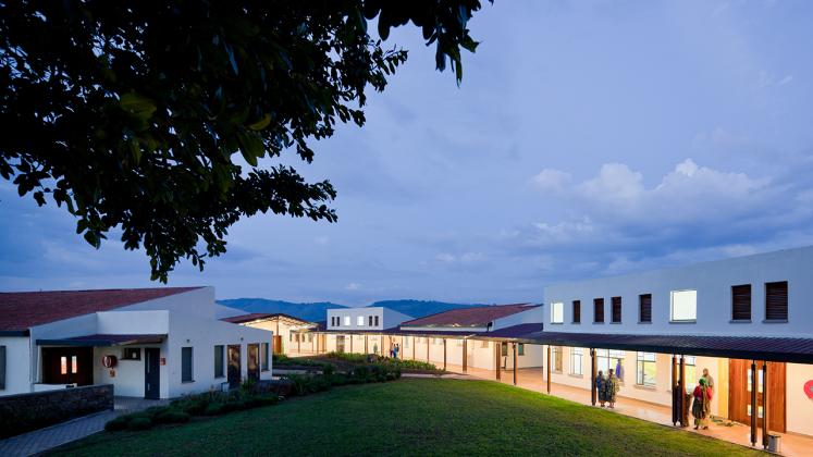Photo of Butaro District Hospital, Photo by Iwan Baan, Courtyard Nighttime Photo Aerial View