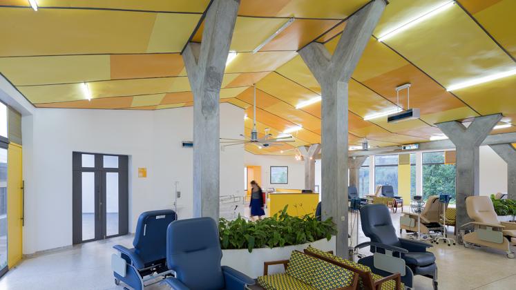 Photo of Butaro Ambulatory Cancer Center, Photo by Iwan Baan, Patient Ward with View of Individual Chairs