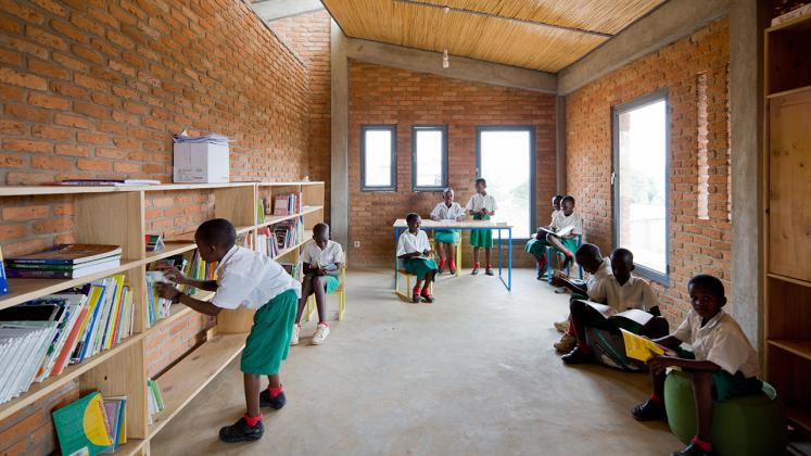 Photo of the Umubano Primary School, Photo by Iwan Baan, View of Shared Library and Classroom Space