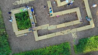 An aerial view of Corn / Meal, an installation at Central Middle School in Columbus, IN as part of Exhibit Columbus 2019
